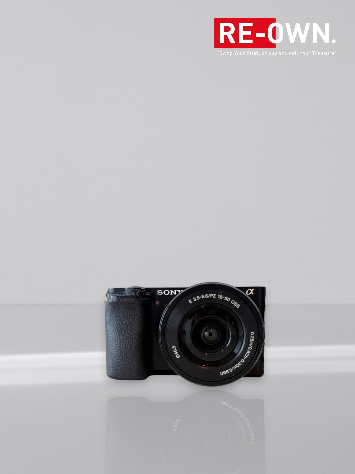 Sony A6000 body + Sony E 16-50mm lens +SD card
