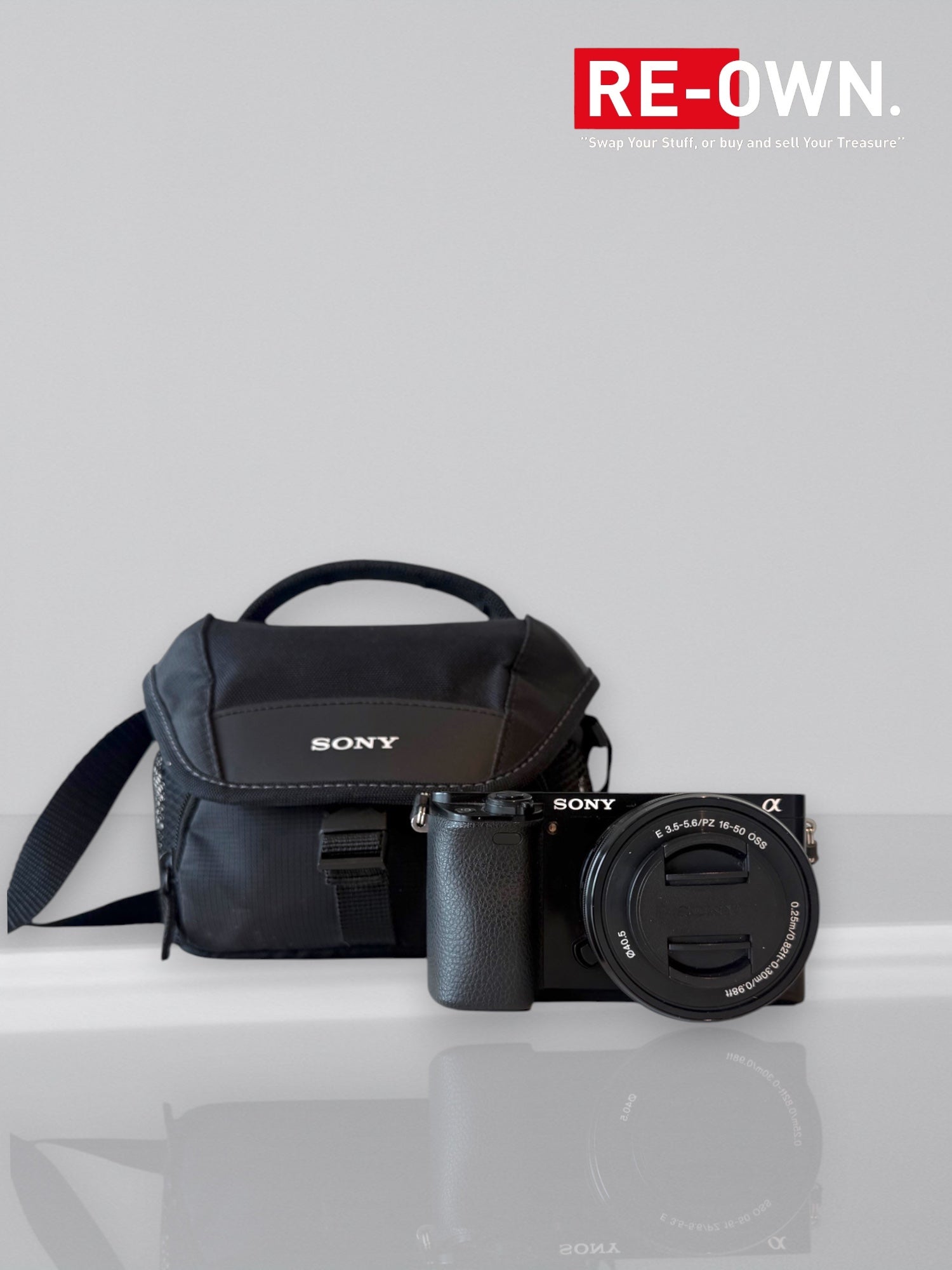 Sony A6000 body + Sony E 16-50mm lens +SD card