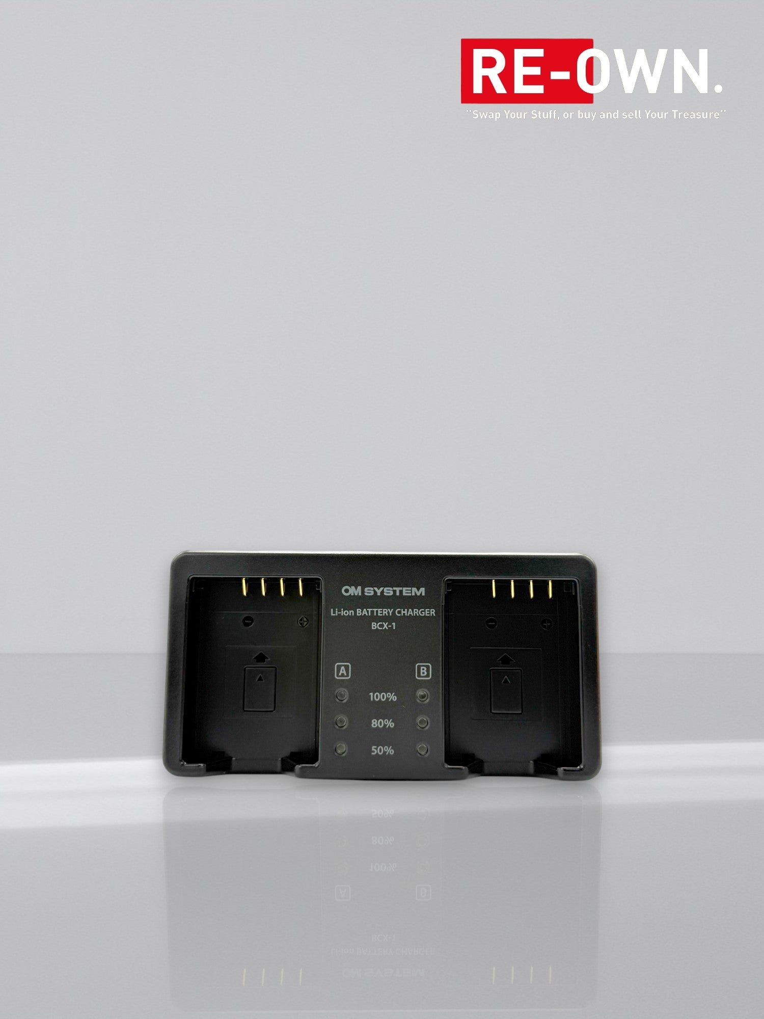 Om system SBCX- 1 batterij BLX1 + lader set